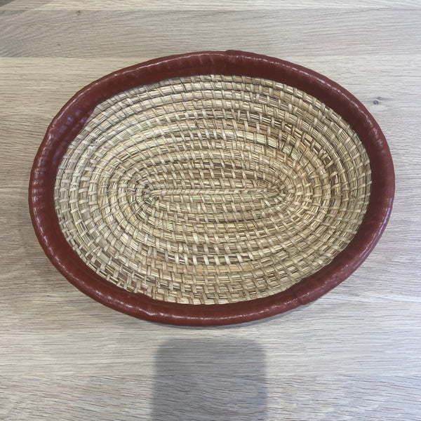 handmaded bowl with brown leather trim