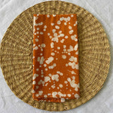 Orange and white napkin