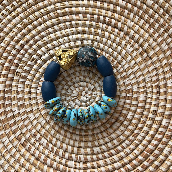 Handmade Recycled Glass Bead Bracelet. Navy and Aqua Blue with Brass Bead.