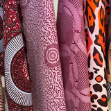 Collection of patterned fabrics with various designs.