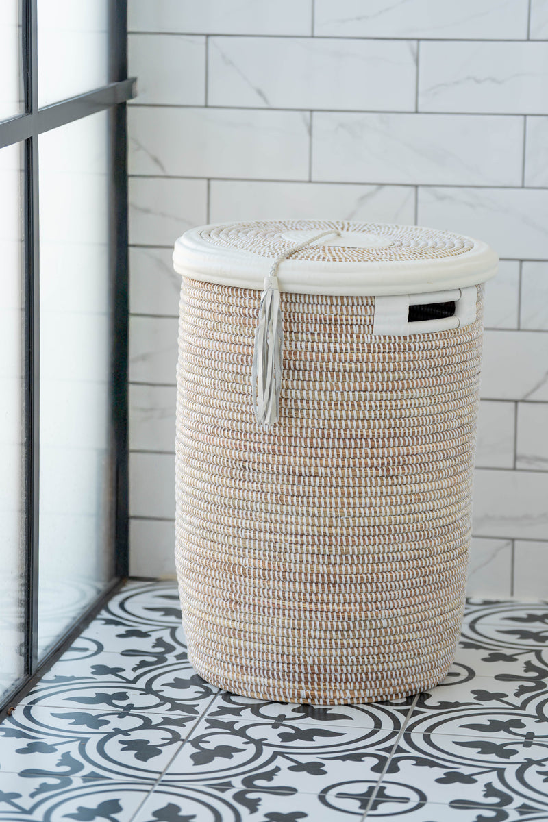 Woven white basket on tiles