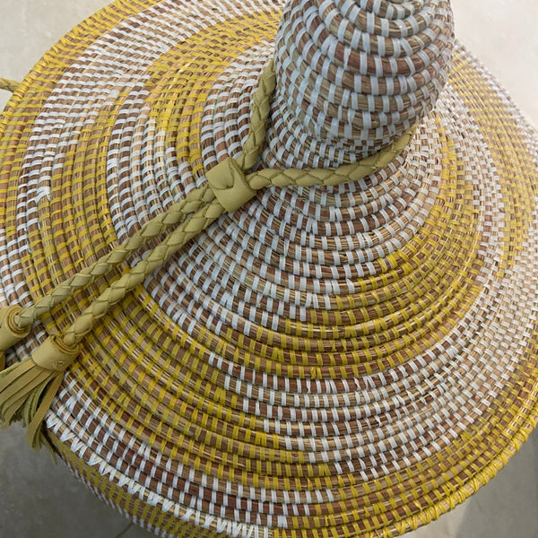 yellow and white lidded basket