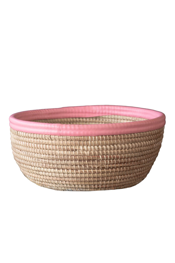 NATURAL ROUND BASKET WITH PINK LEATHER TRIM. THE SUPER BASKET.