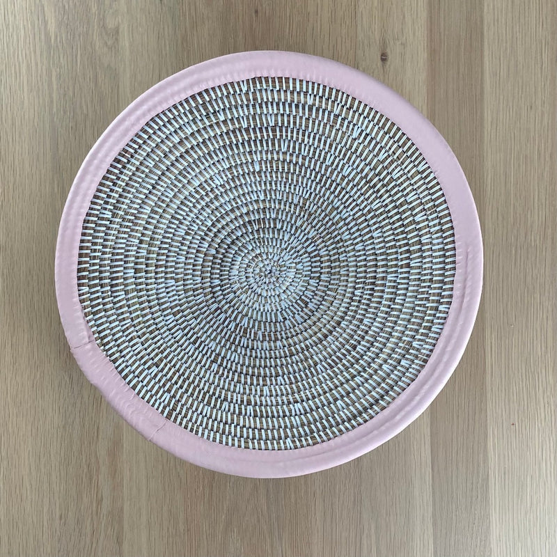 White basket bowl with pink leather trim